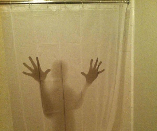 Shadowy Figure Shower Curtain